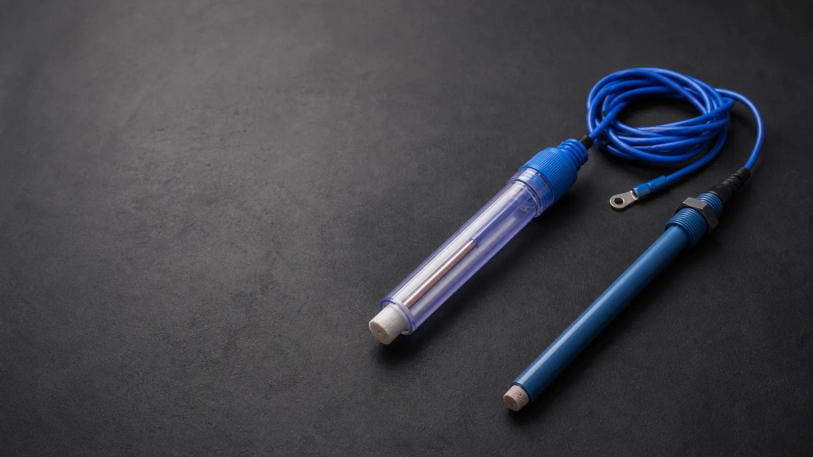 Permanent reference electrodes with protected bodies and attached lead cables