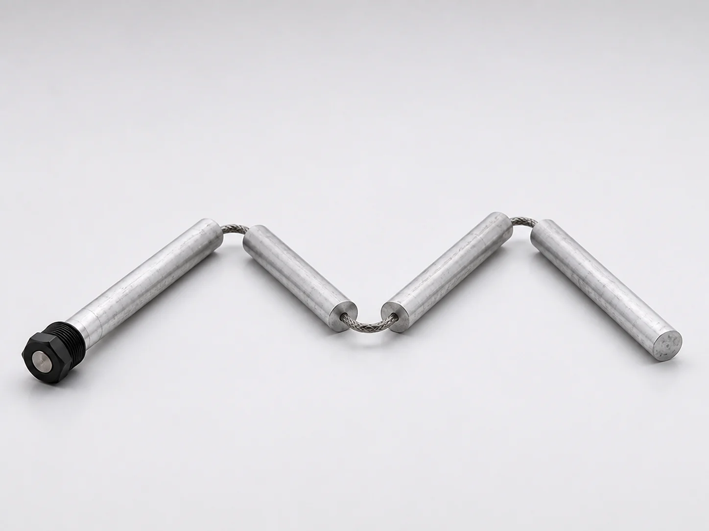Segmented flexible magnesium anode rod for restricted installation clearance